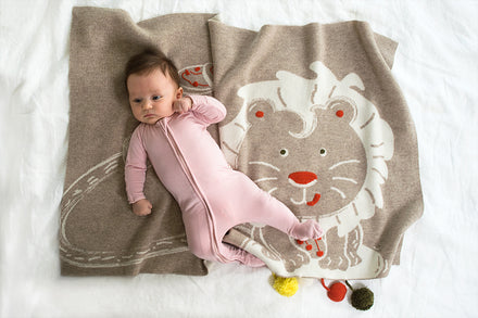 Image of baby and Liam the lion themed blanket